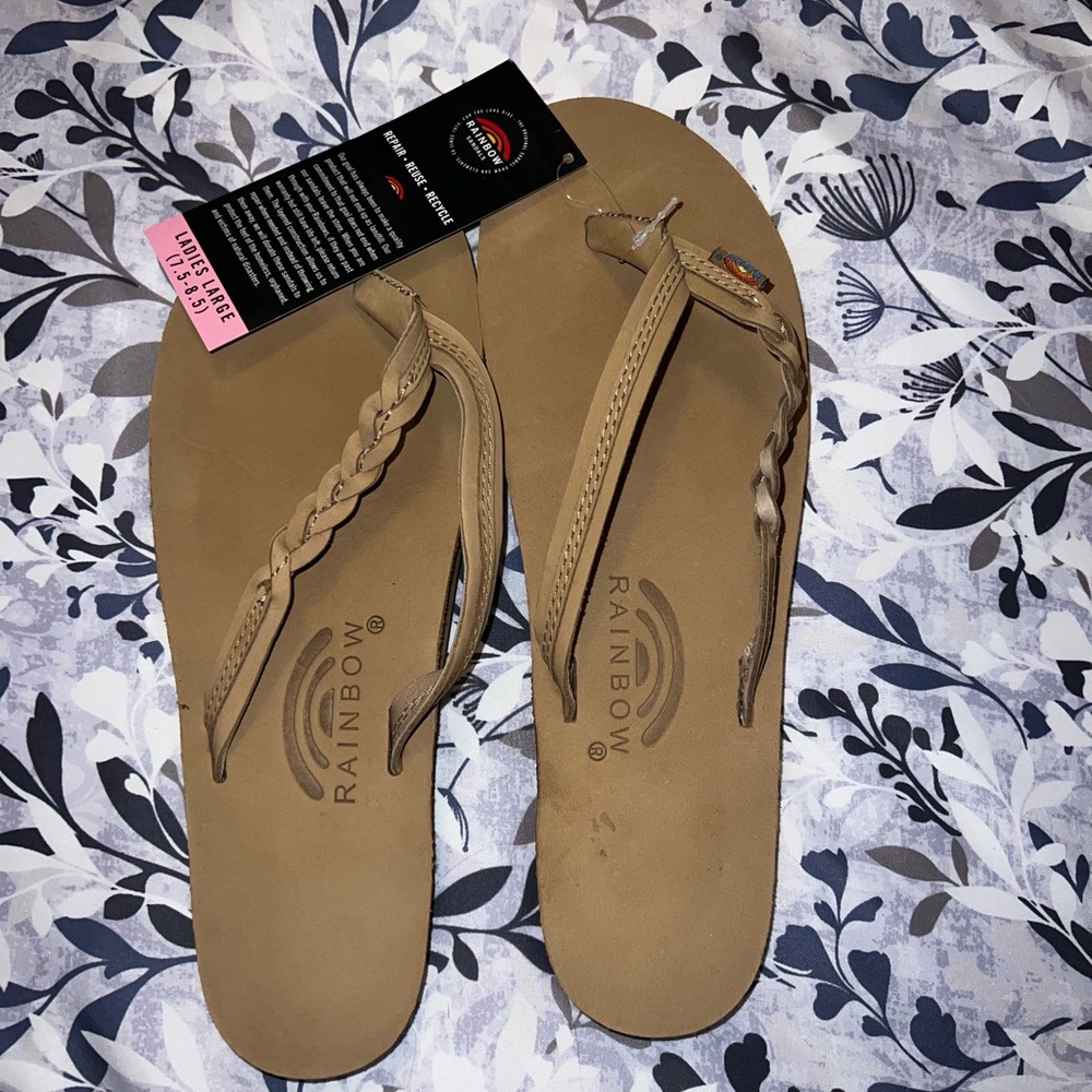 Rainbow Flip Flops
Size Large 7.5-8.5
Never Worn